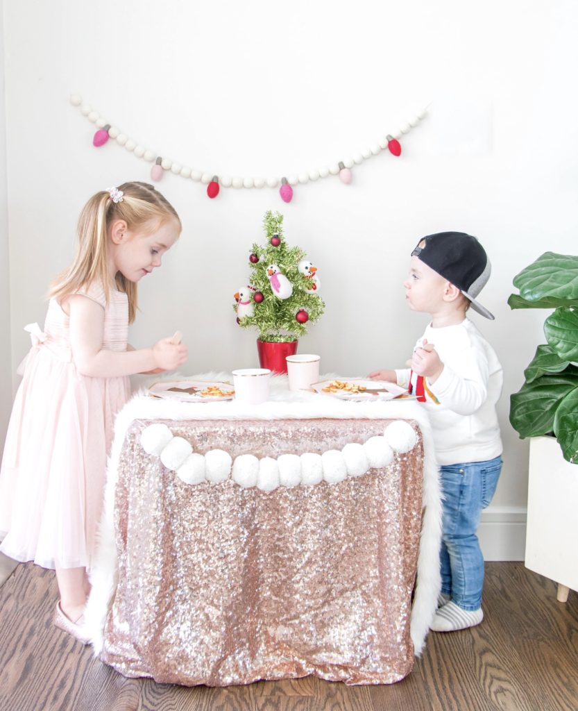 Kids’ Christmas Party Table with rose gold sequin tablecloth 