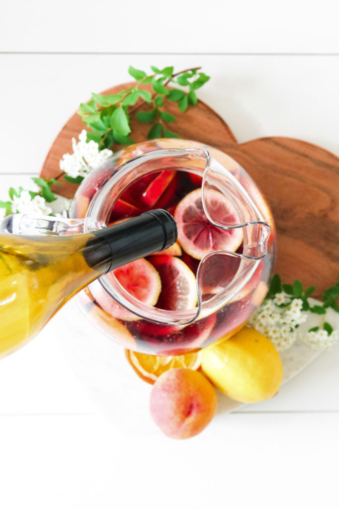 Overhead shot pouring summer red sangria