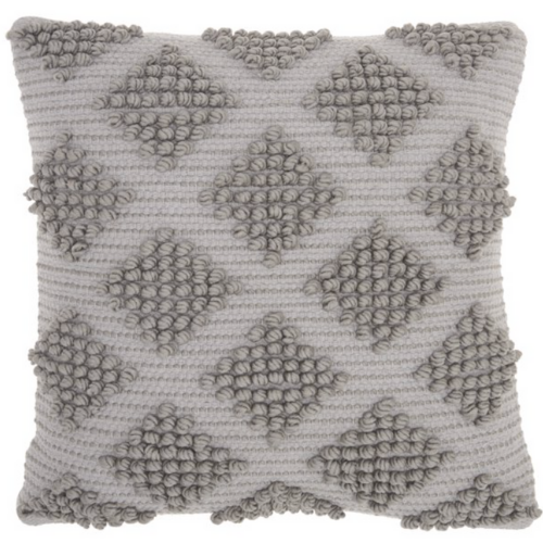 Gray tufted pillow