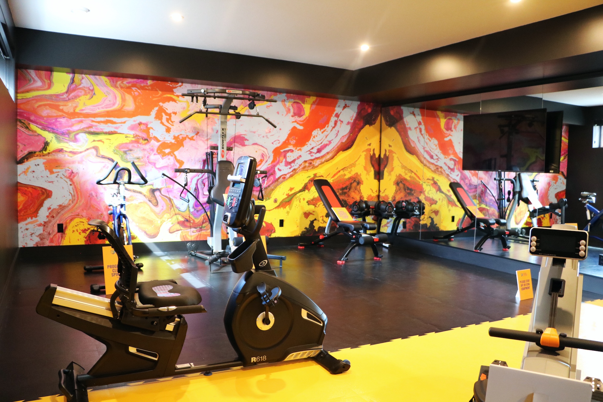 bright and colourful basement gym