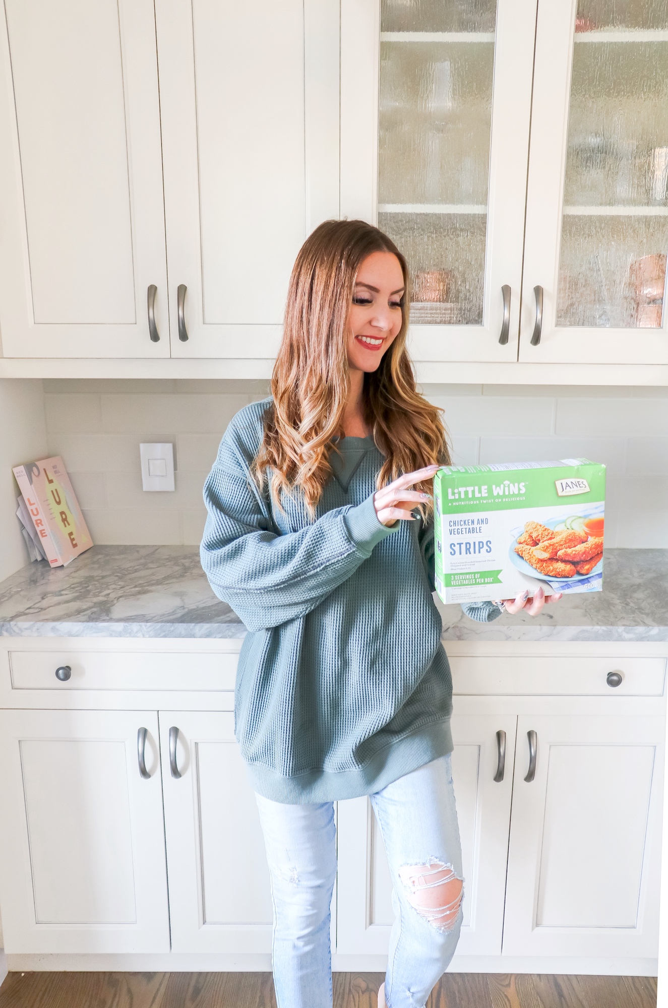 Blogger Holly Hunka with Little Wins chicken