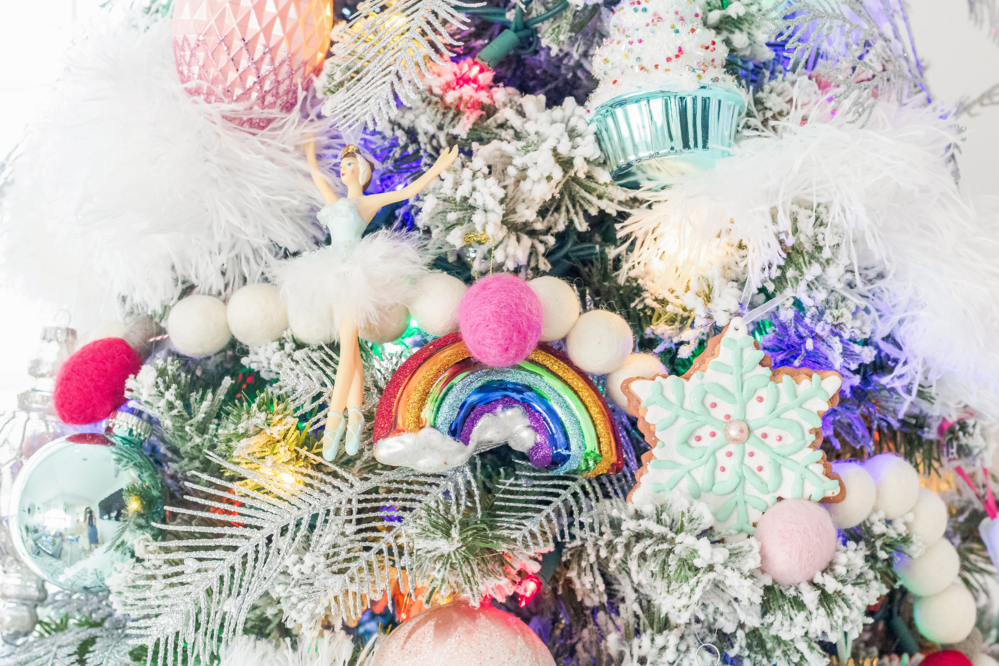 Closeup shot of rainbow Christmas ornaments