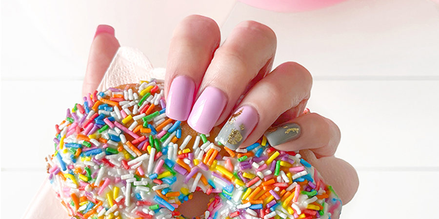 Hot pink and gold foil donut nails