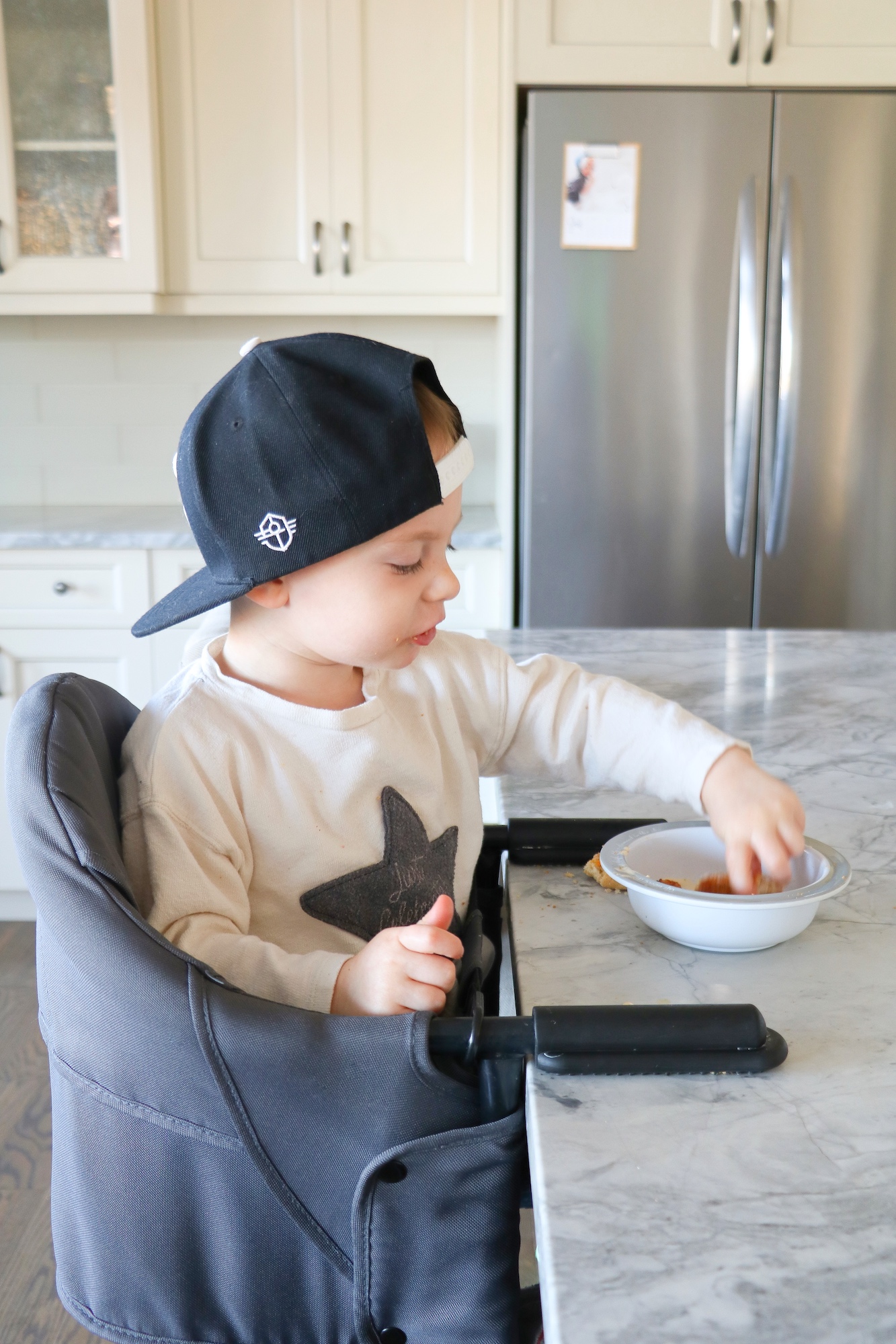 Toddler eating chicken nuggets