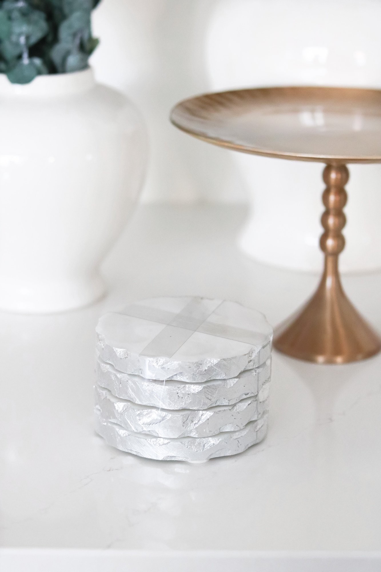 Brass cake stand and marble coaster