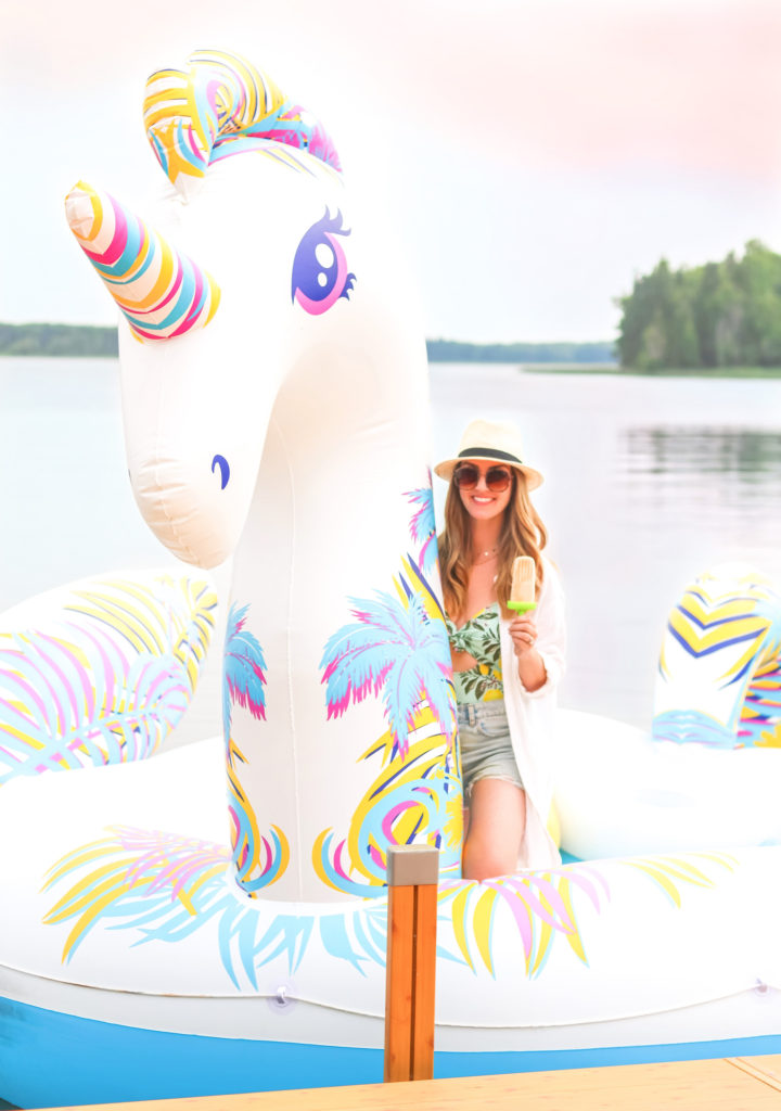 Giant unicorn pool float with boozy popsicles
