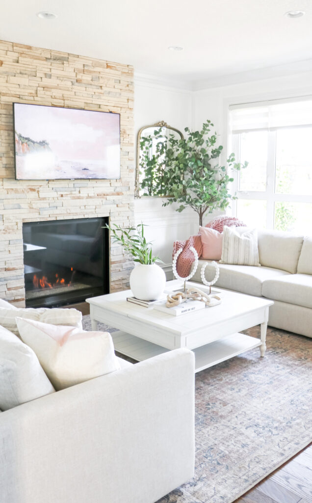Sofa Land Light and bright living room refresh - neutral living room decor with pink accents