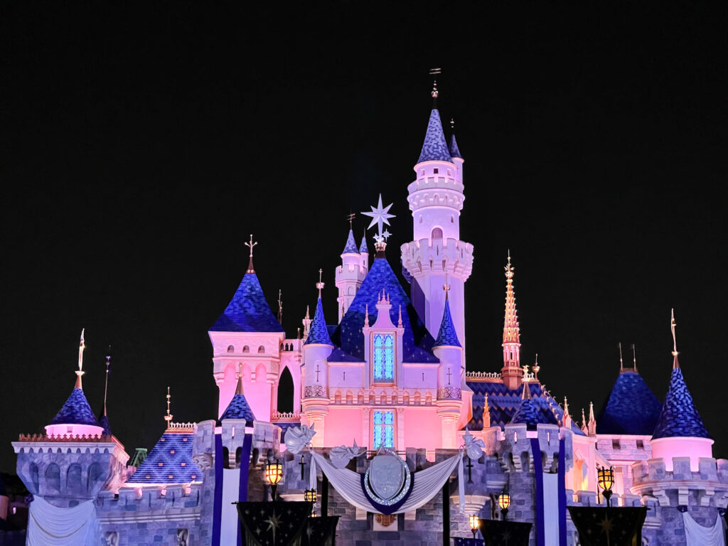 Disneyland castle at night - staying at Disneyland Until close