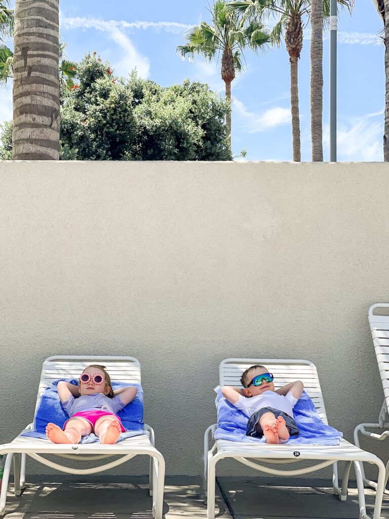 Loungin at pool at HOJO Anaheim hotel - hotels close to Disneyland